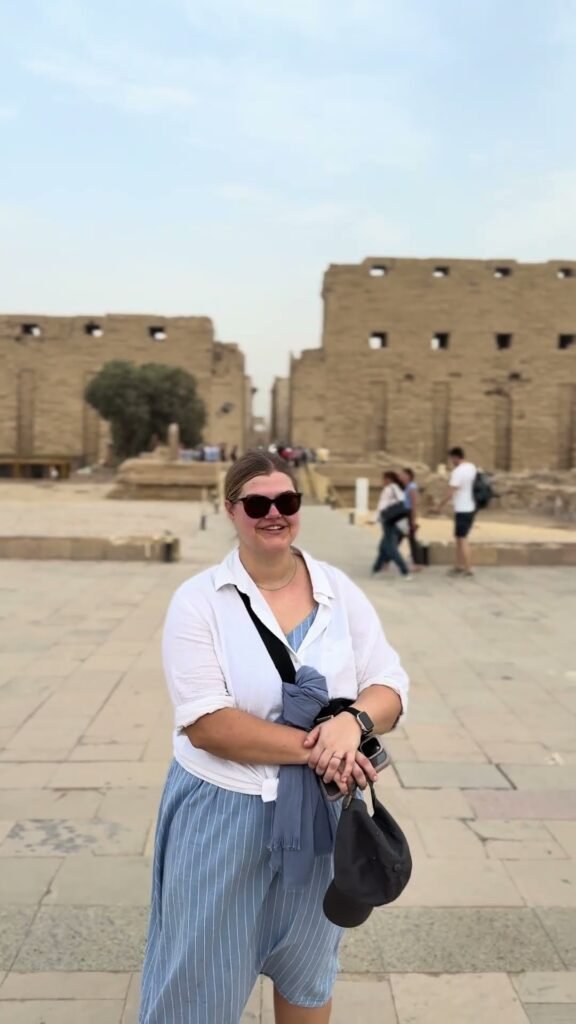 Guest standing at Karnak Temple in Luxor during a Dr Mo Tours day tour